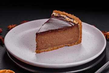 Delicious, fresh, sweet chocolate cake with nuts cut into slices