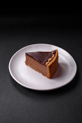 Delicious, fresh, sweet chocolate cake with nuts cut into slices