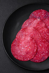Delicious smoked salami sausage with salt, spices and herbs
