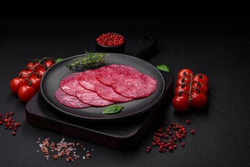 Delicious smoked salami sausage with salt, spices and herbs