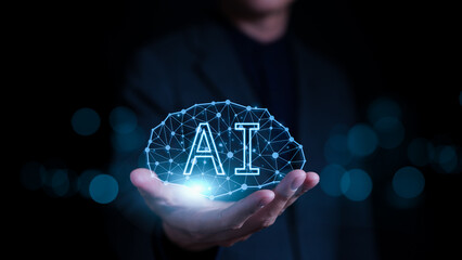 AI, Artificial intelligence concept. Virtual artificial intelligence brain connection in hands of the businessman. Internet of Things, iot, Use of AI to help working and used in daily life, Chat bot,
