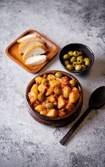 Puerto Rican traditional potato red kidney bean stew in a bowl