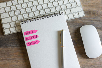 notebook and pen on keyboard