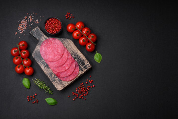 Delicious smoked salami sausage with salt, spices and herbs