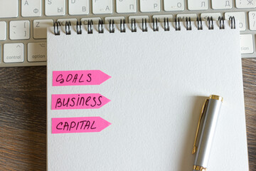 notebook and pen on keyboard