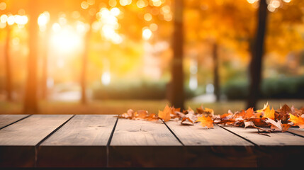 Naklejka na ściany i meble Une table en bois vide en automne avec un arrière plan automnal.
