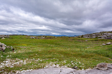 Fototapeta na wymiar Irish pastoral landscape with cloudy sky