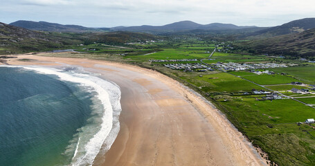 Fototapeta na wymiar Aerial view of Beautiful Sandy Beach Tullagh Strand on the Atlantic Ocean County Donegal Ireland