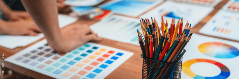 Poster graphic designer brainstorm logo and graphic art at busy creative studio workshop. experiment and br