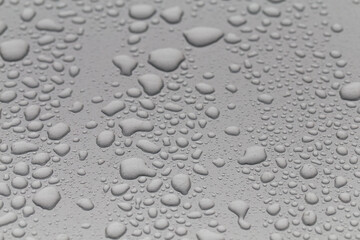 Water droplets on car background