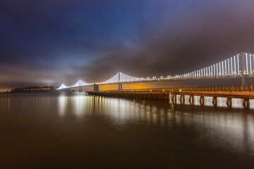 Fototapeta na wymiar Oakland bay bridge San Francisco ca at night