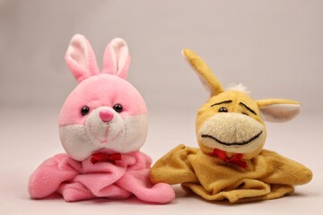 Soft hand puppet toy on a white background. Puppet show concept.