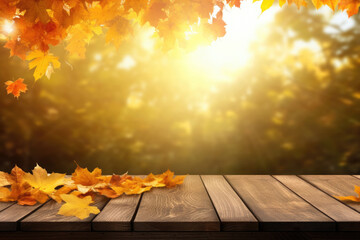 Autumn background with wooden table and colored fall leaves. Composition with copy space