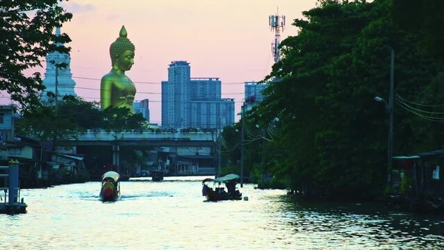 landscape of big buddha in the city large Buddha statue in Bangkok Wat Pak Nam Phasi Charoe Thailand .