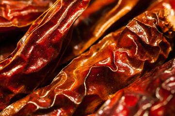 Close-up photo of spicy, dried red chili (pepper) fruit.