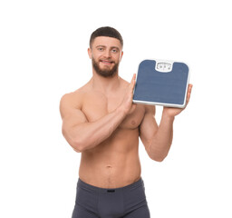 Fototapeta premium Portrait of happy athletic man with scales on white background. Weight loss concept