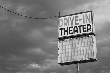 Black and white photo of vintage drive-in theater sign