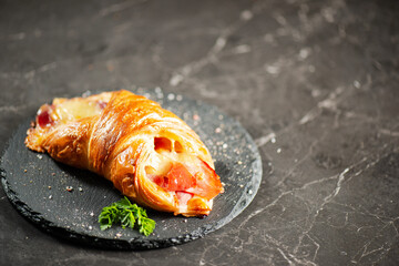 Viennoiserie pastry filled with smoked and baked fresh ham off the bone and tasty cheese.