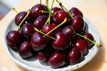 New harvest of fresh ripe dark red cherry berry in Provence, France close up