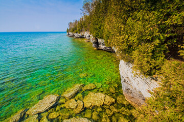 Green Waters of Lake Michigan and The Limestone Bluffs of Cave Point, Cave Point County Park, Door County, Wisconsin, USA