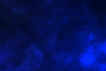 blue smoke clouds moving turbulent on a blue background.