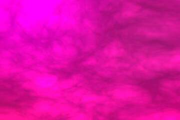 pink smoke clouds moving turbulent on a pink background.