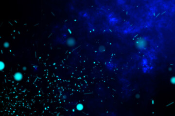 Burning blue sparks rise from fire ,Fire Particles on blue background.