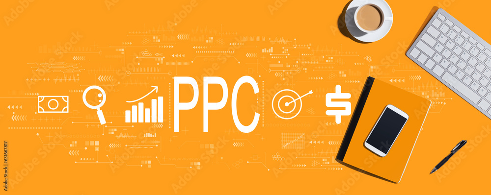 Aufkleber ppc - pay per click concept with a computer keyboard and office items