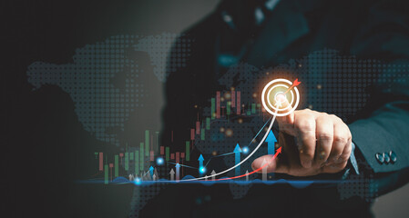 Marketing targeting concept. Businessman sets company goals and direction to guide business plan. Corporate companies prepare marketing plans for the future. © teerasub
