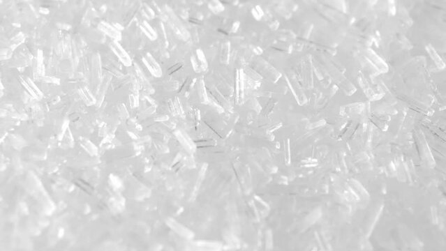 Monosodium glutamate (MSG) is a flavor enhancer commonly used in food.Monosodium glutamate (MSG) is a flavor enhancer commonly used in food. This macro video, shot with a probe lens, showcases the cry