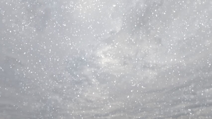 cute snowfall on clouds on sky background - photo of nature