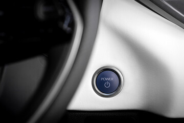  Start stop engine modern new car button, close up