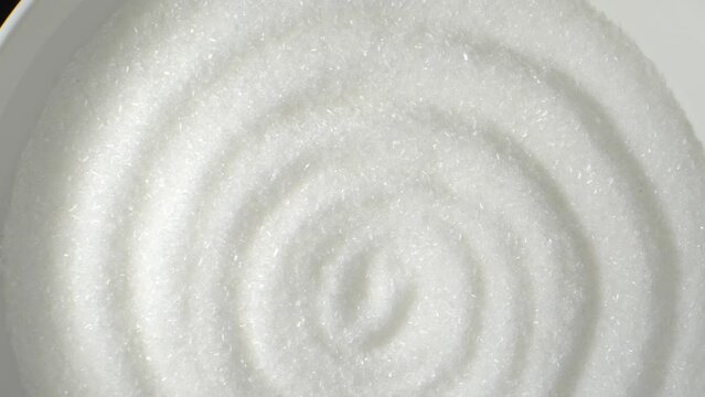 Monosodium glutamate (MSG) is a flavor enhancer commonly used in food. This macro video, shot with a probe lens, vividly captures the crystalline structure and intricate details of MSG particles
