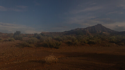 Moonlit American Southwest desert landscape with Gooseberry Mesa, Utah, under a night sky with...