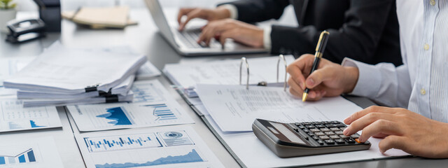 Auditor and accountant team working in office, analyze financial data and accounting record with...