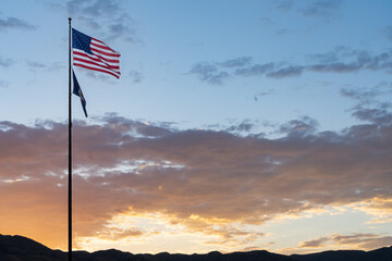 american flag at sunset
