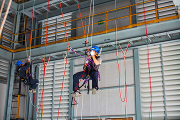 Male worker training rope access © chitsanupong