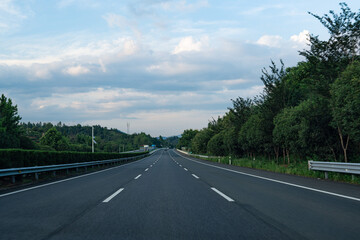 highway road and green forest with mountain nature landscape