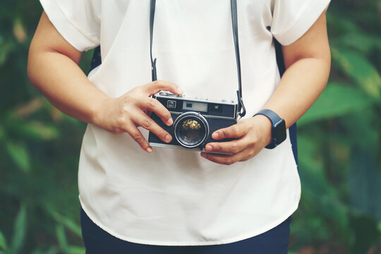 woman with vintage camera