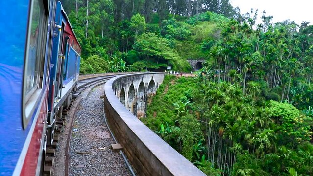 Train Passing the Nine Arches Demodara Bridge or the Bridge in the Sky. Nine Arches Bridge is Located in "Demodara" near Famous Ella City, Sri Lanka.