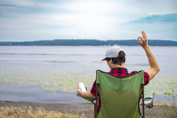 Fototapeta premium Resting in the camping chair