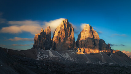 The Three Peaks of Lavaredo or Tre Cime di mountain at sunrise, Dolomites mountains, Italy, Europe - 631702011