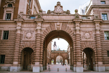 Fototapeta na wymiar Arched entry to the Swedish Parliament building from the Riksbron bridge