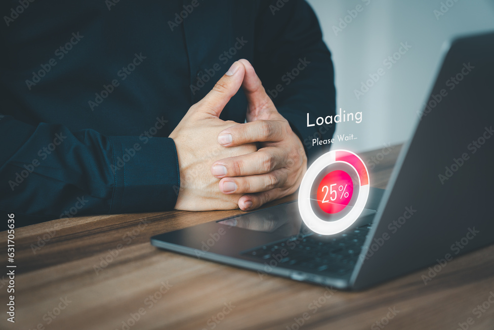 Poster Adult man using a laptop computer for download and update software and waiting to loading digital file data form website, very slow internet form wifi. Concept of waiting for load of loading symbol.