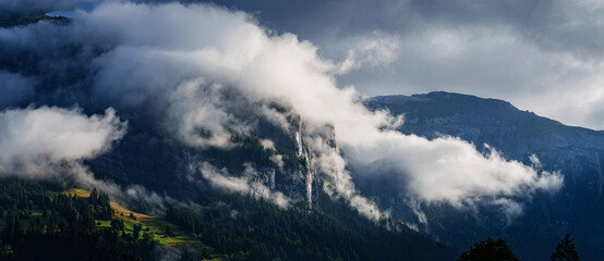 Panorama of Flimserstein emerging from the fog in the morning light