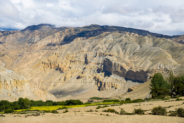 Beautiful and Dramatic Tibetan Landscape with Farmalnd in Ghiling Village of Upper Mustang in Nepal