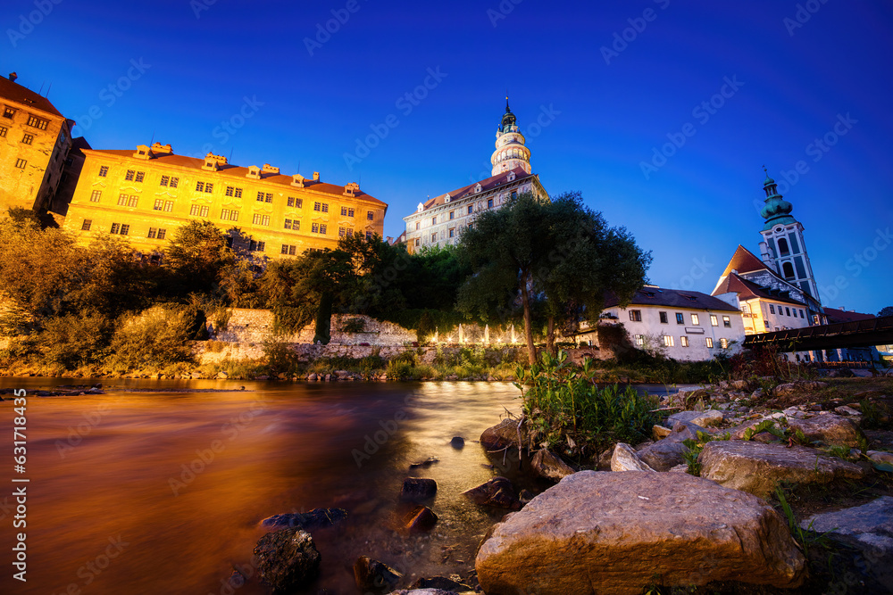 Wall mural evening at the vltava river in beautiful cesky krumlov in the czech republic, with the castle domina