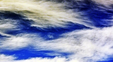 Cloudscape with beautiful white clouds in the blue sky