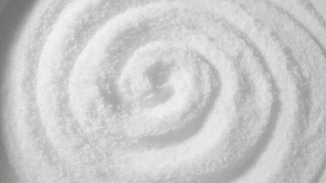 Iodized Refined Salt is a pure and processed sodium chloride product enriched with essential iodine for thyroid health. The probe lens reveals its crystal clarity.
