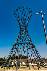Abstract cone shaped iron monument in park